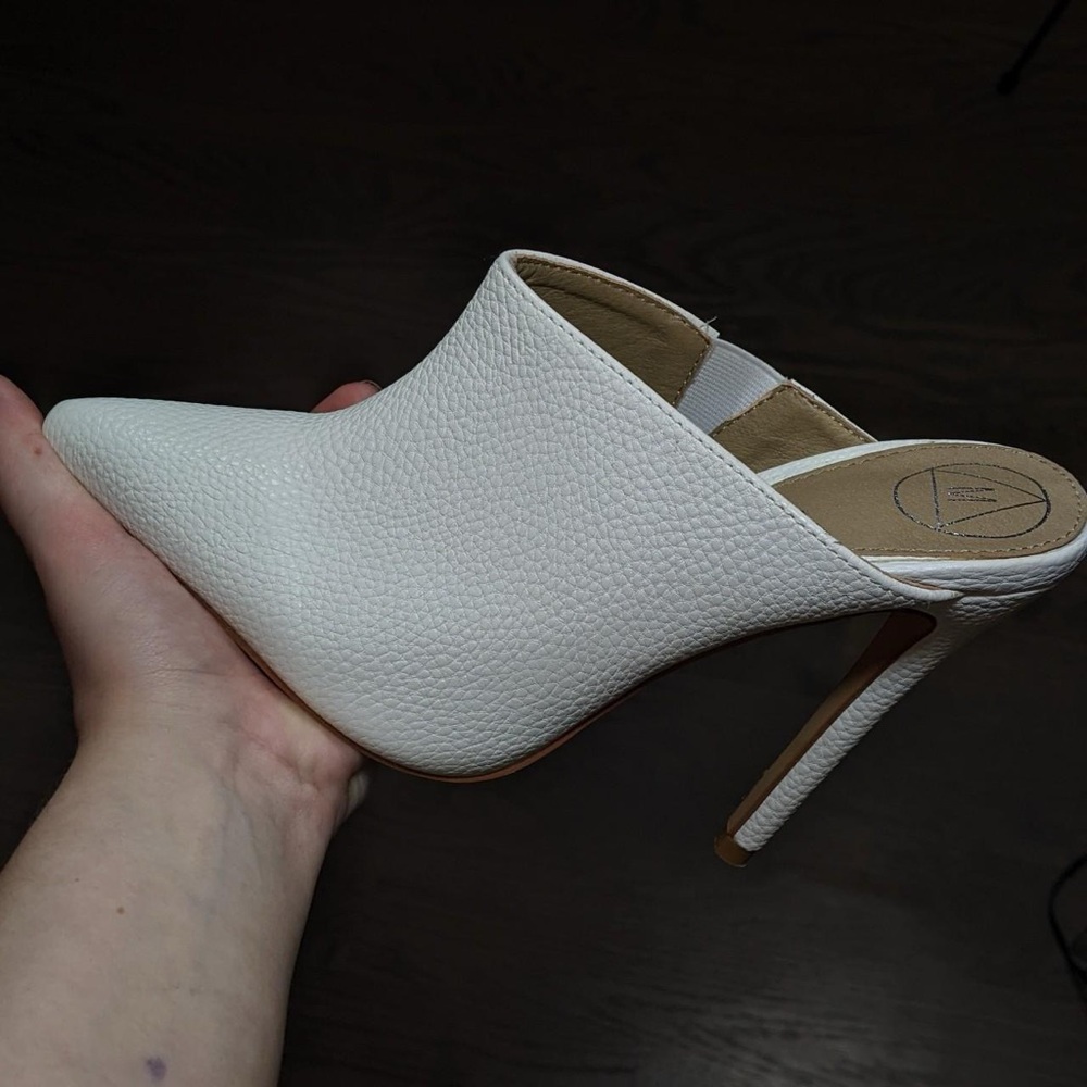 Closed toe stiletto white boot from Missguided. Size 5. Faux leather, open back